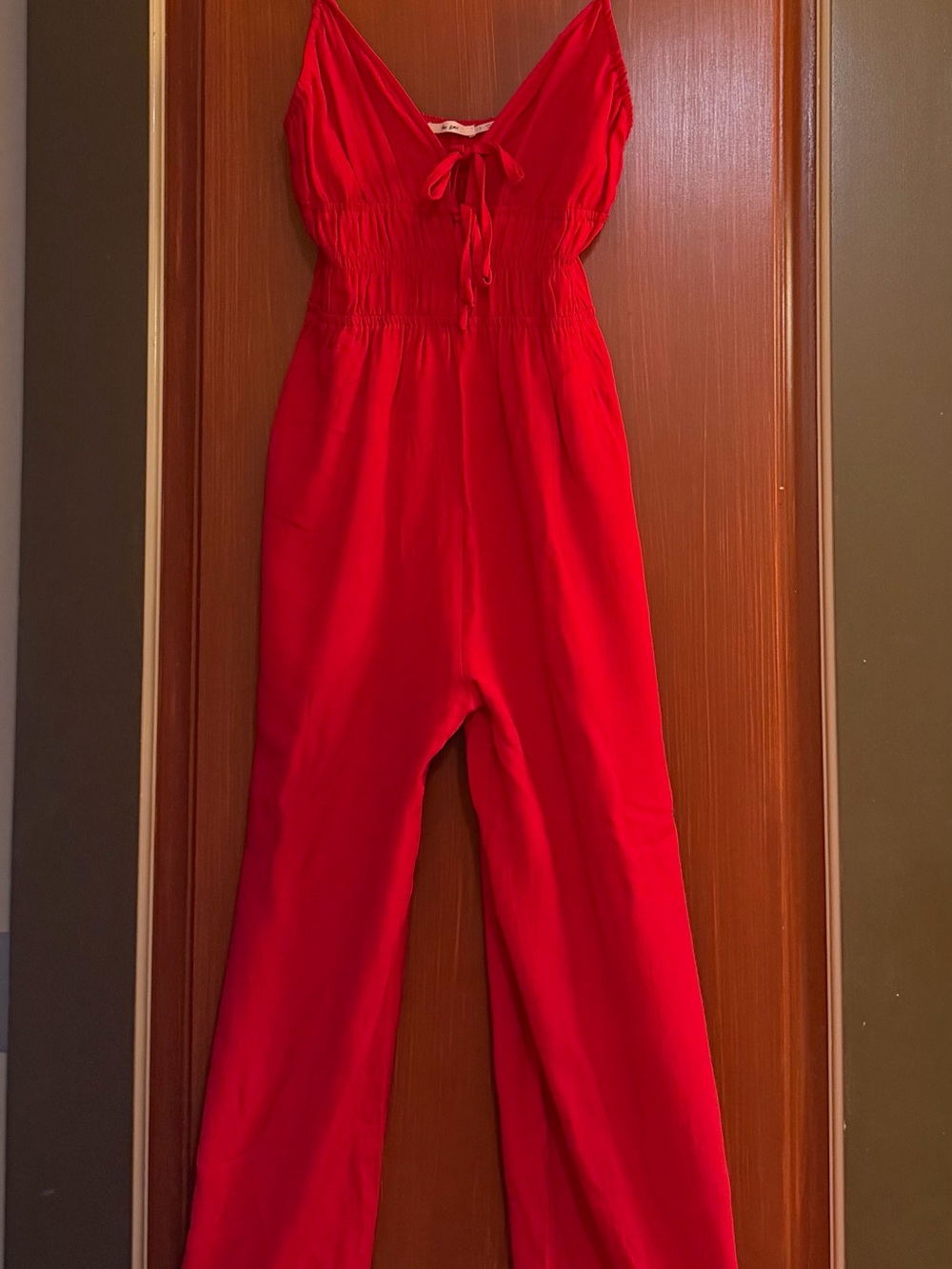 Sleeveless Red V-Neck Jumpsuit with Smocked Waist